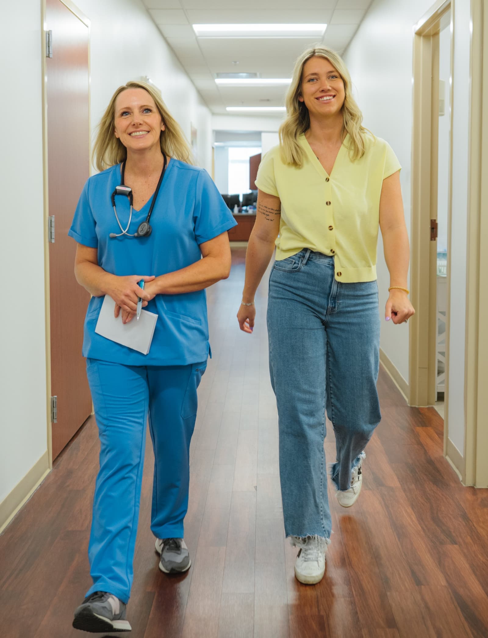Bookmark Medical care team walking through a clinic hallway